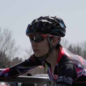 Woman racing on a velodrome