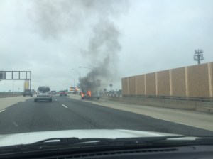 Car on fire on the side of the interstate, Philadelphia