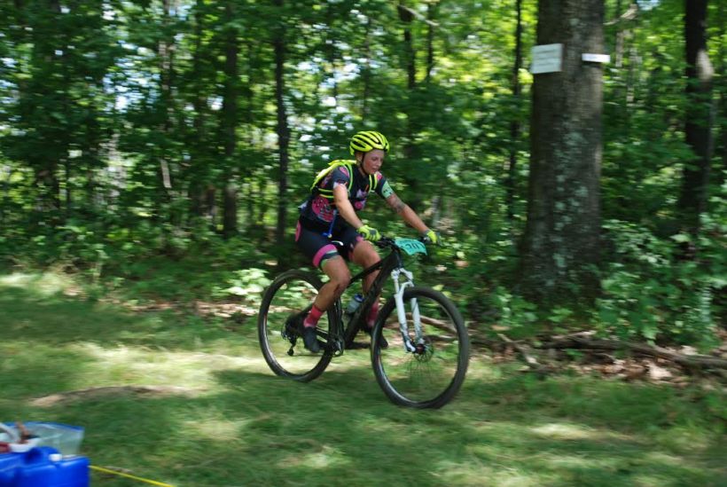 Taylor crushing at mile 70, aid station snaps a pic as she pushes right on past 